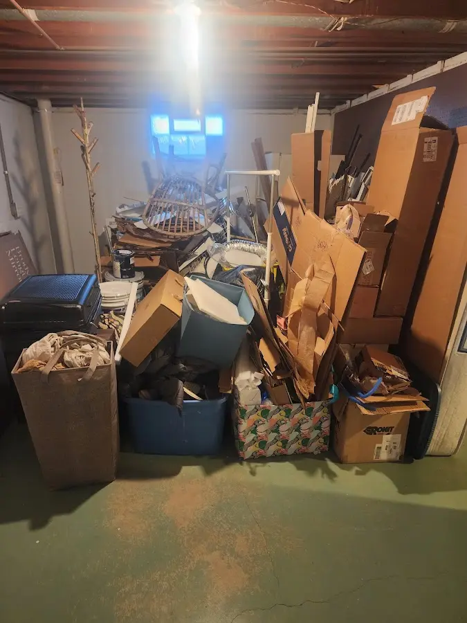 Roll-off dumpster container at job site for 2 Yard Dumpster Rental in Mentor